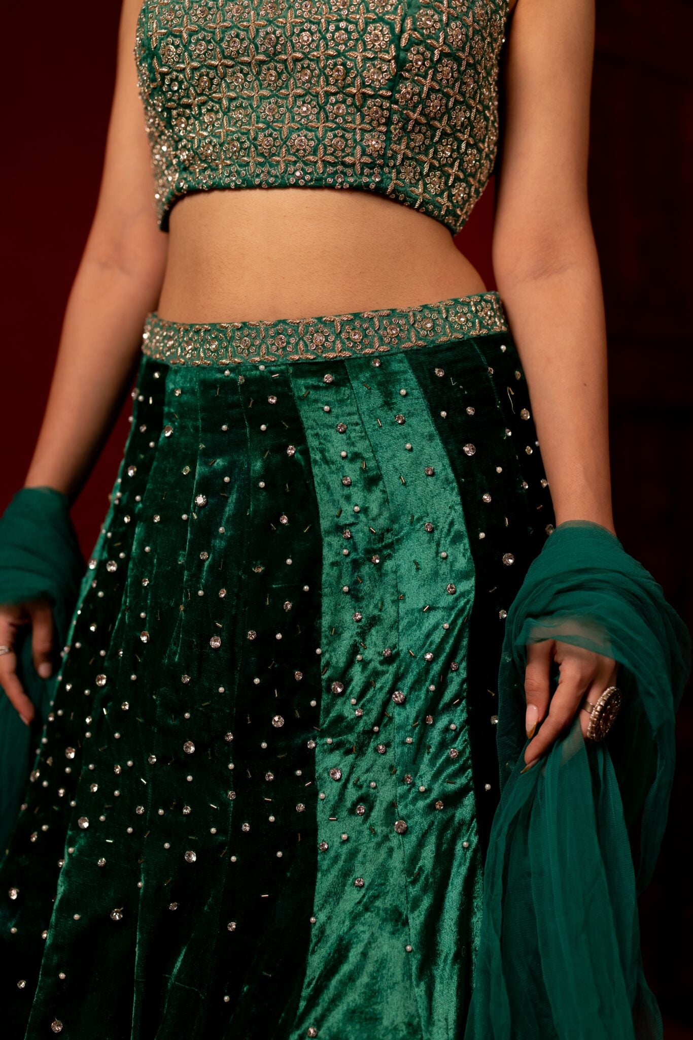 Emerald green velvet hand embroidered lehenga set