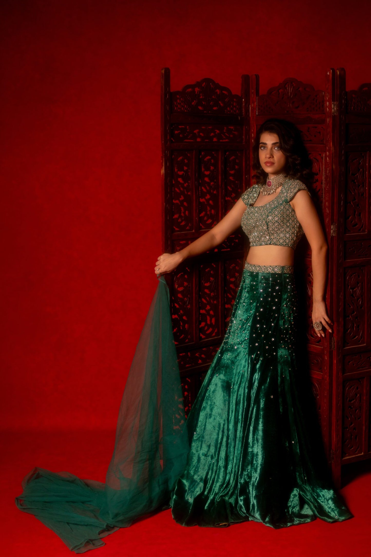 Emerald green velvet hand embroidered lehenga set