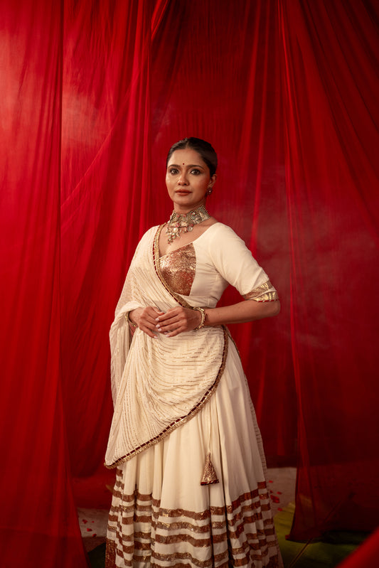 Tripura Ivory White Real Lampa Gold Lehenga Set