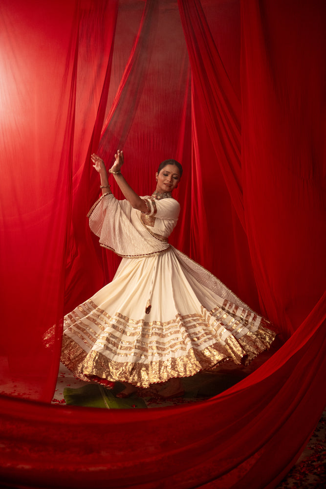Tripura Ivory White Real Lampa Gold Lehenga Set