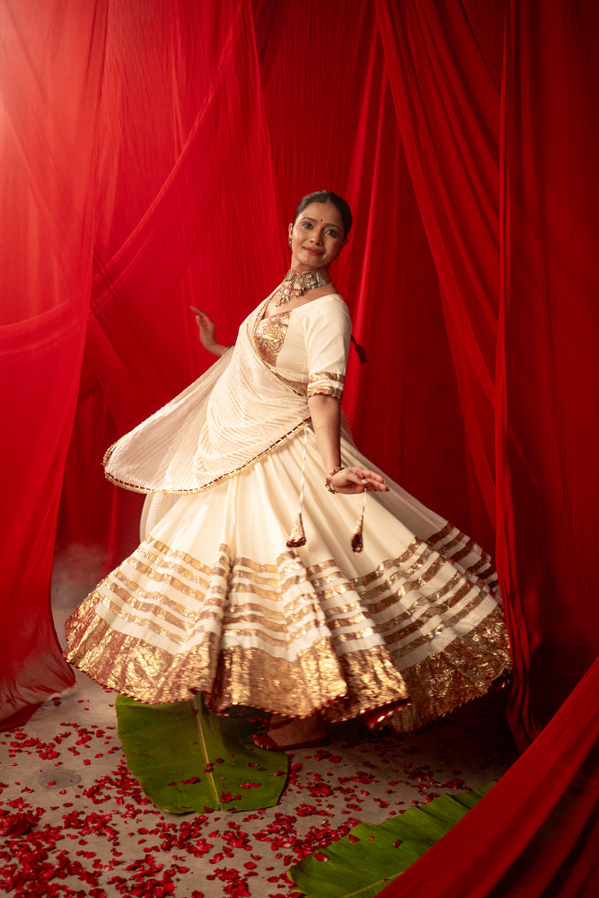 Tripura Ivory White Real Lampa Gold Lehenga Set