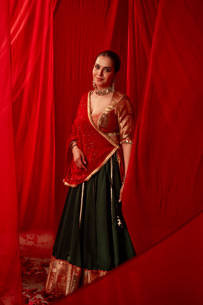 Chhaya Orange & Deep Green Contrast Border Lehenga Set