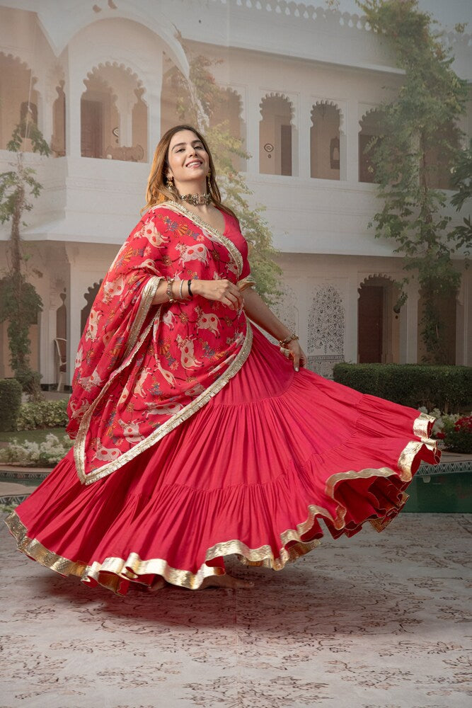 Carrot Red tiered Lehenga Set with Nandi & Krishna Motif Dupatta