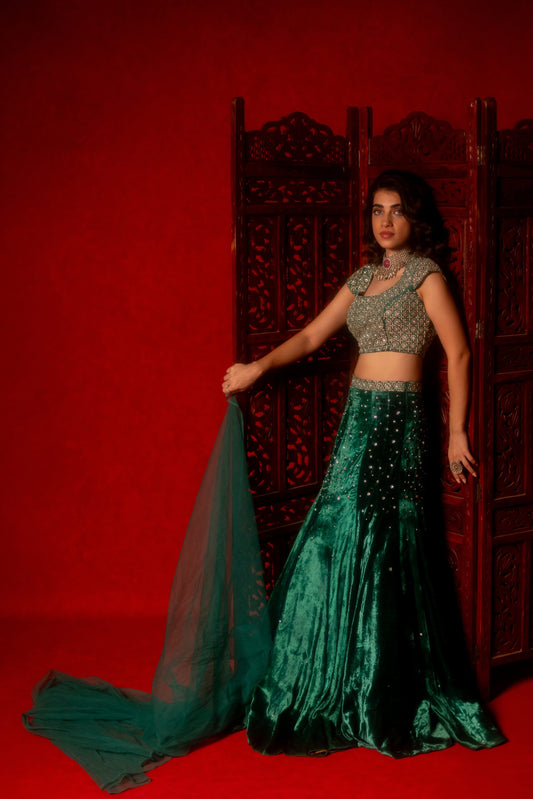 Emerald green velvet hand embroidered lehenga set