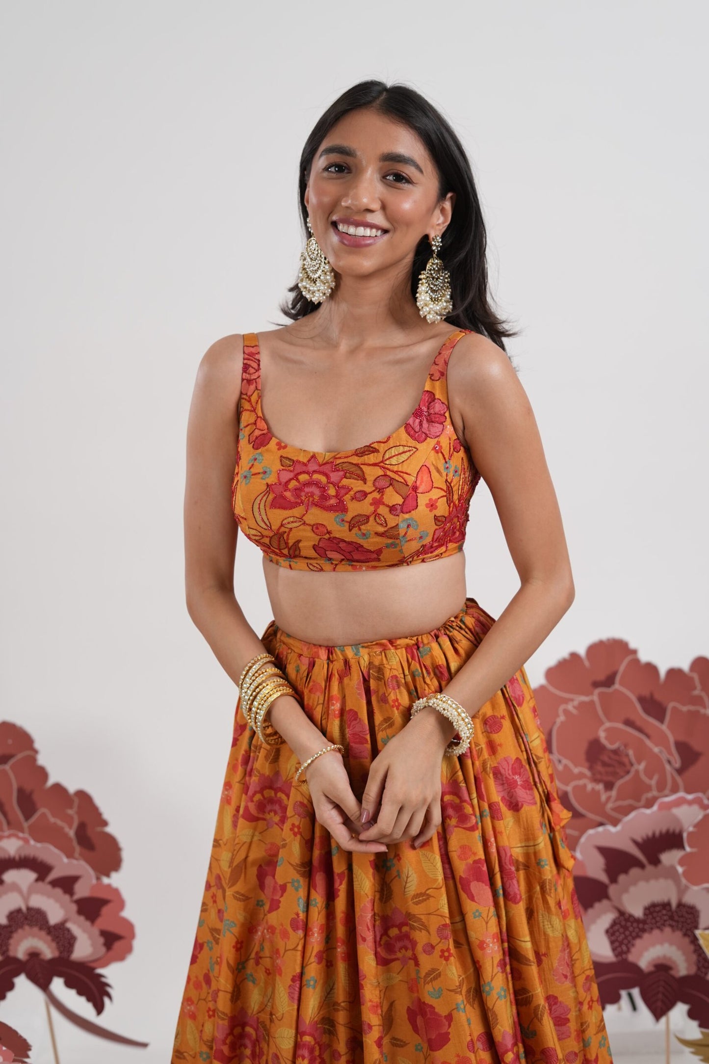 Genda Saffron Printed Lehenga Set