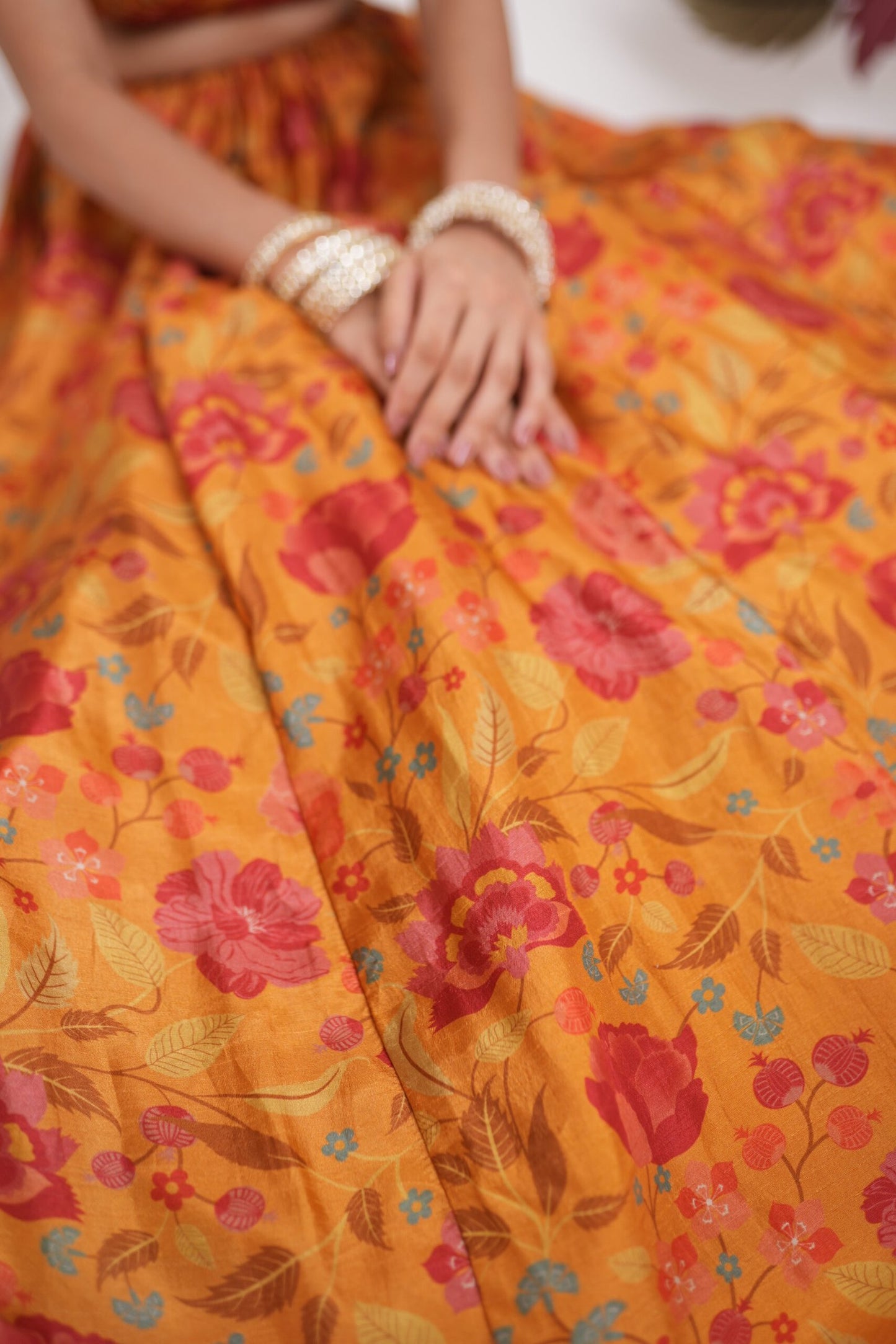 Genda Saffron Printed Lehenga Set