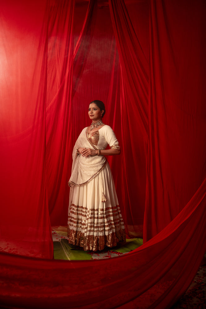 Tripura Ivory White Real Lampa Gold Lehenga Set