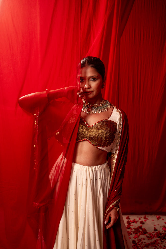Tripura Ivory White Real Lampa Gold Lehenga Set